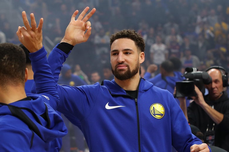 DETROIT, MICHIGAN - DECEMBER 01: Klay Thompson #11 of the Golden State Warriors is introduced prior to playing the Detroit Pistons at Little Caesars Arena on December 01, 2018 in Detroit, Michigan. NOTE TO USER: User expressly acknowledges and agrees that, by downloading and or using this photograph, User is consenting to the terms and conditions of the Getty Images License Agreement. (Photo by Gregory Shamus/Getty Images)